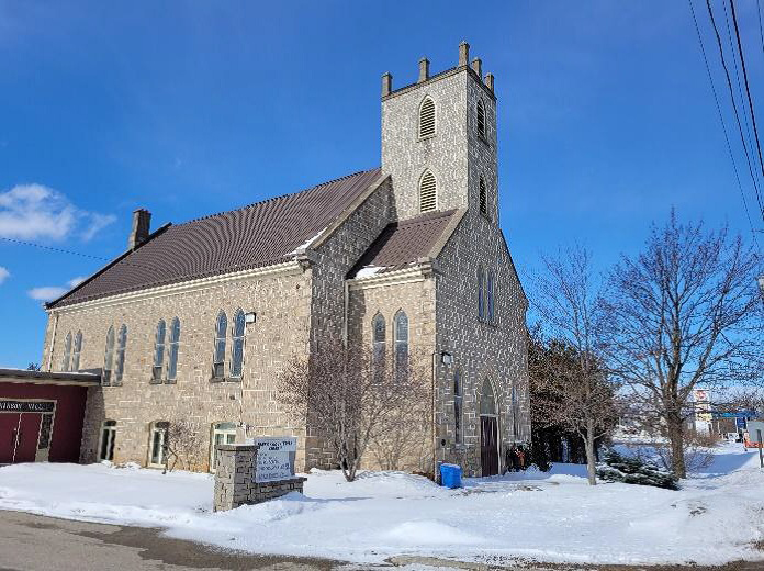 Stone church building in winter identified as Duff’s Presbyterian Church.